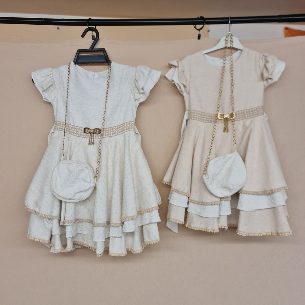 European Elegance. Beautiful Neutral Tone Tier Layered Dress $40 Each